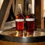 CHRIS STAPLETON AND BUFFALO TRACE MASTER DISTILLER HARLEN WHEATLEY INTRODUCE TRAVELLER WHISKEY FULL PROOF