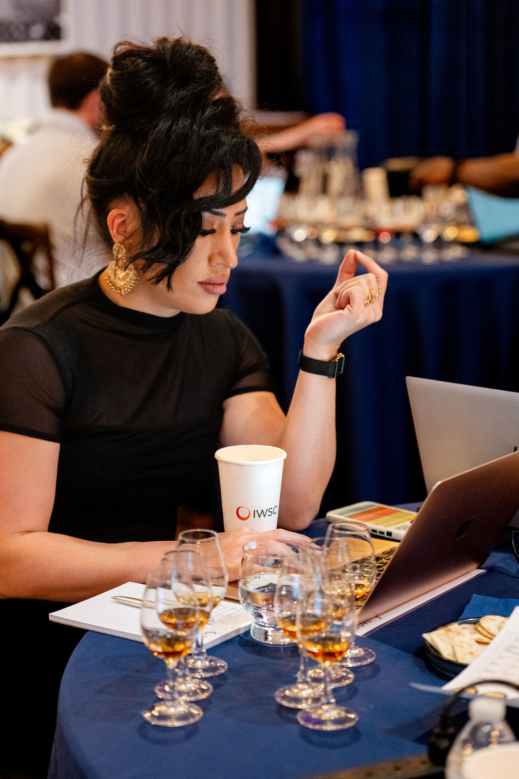 Panel of IWSC judges discussing a spirit during the Kentucky judging